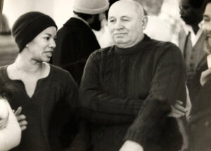Image - Peg Alston with Romare Bearden at an art reception with other artists. circa 1977